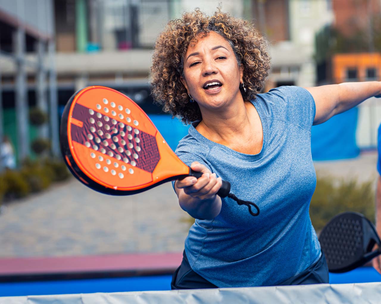 woman playing pickleball